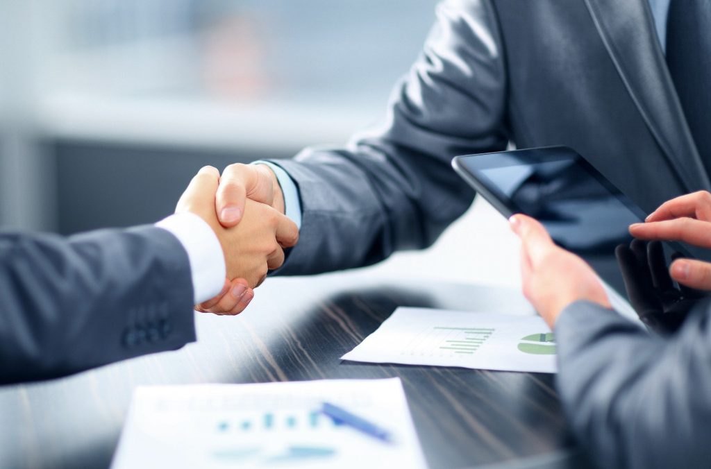 image of shaking hands for investment